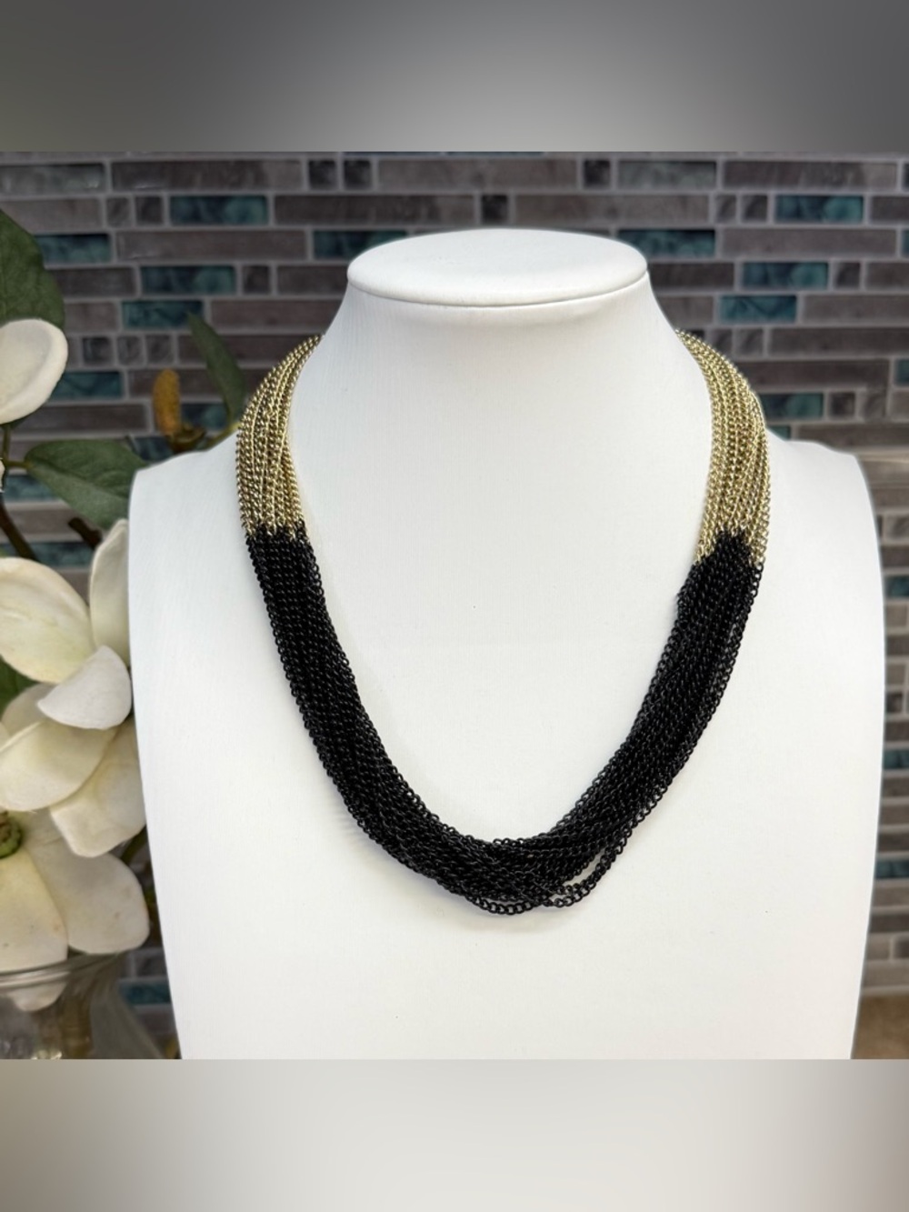 Classic black and gold tone contrast statement necklace